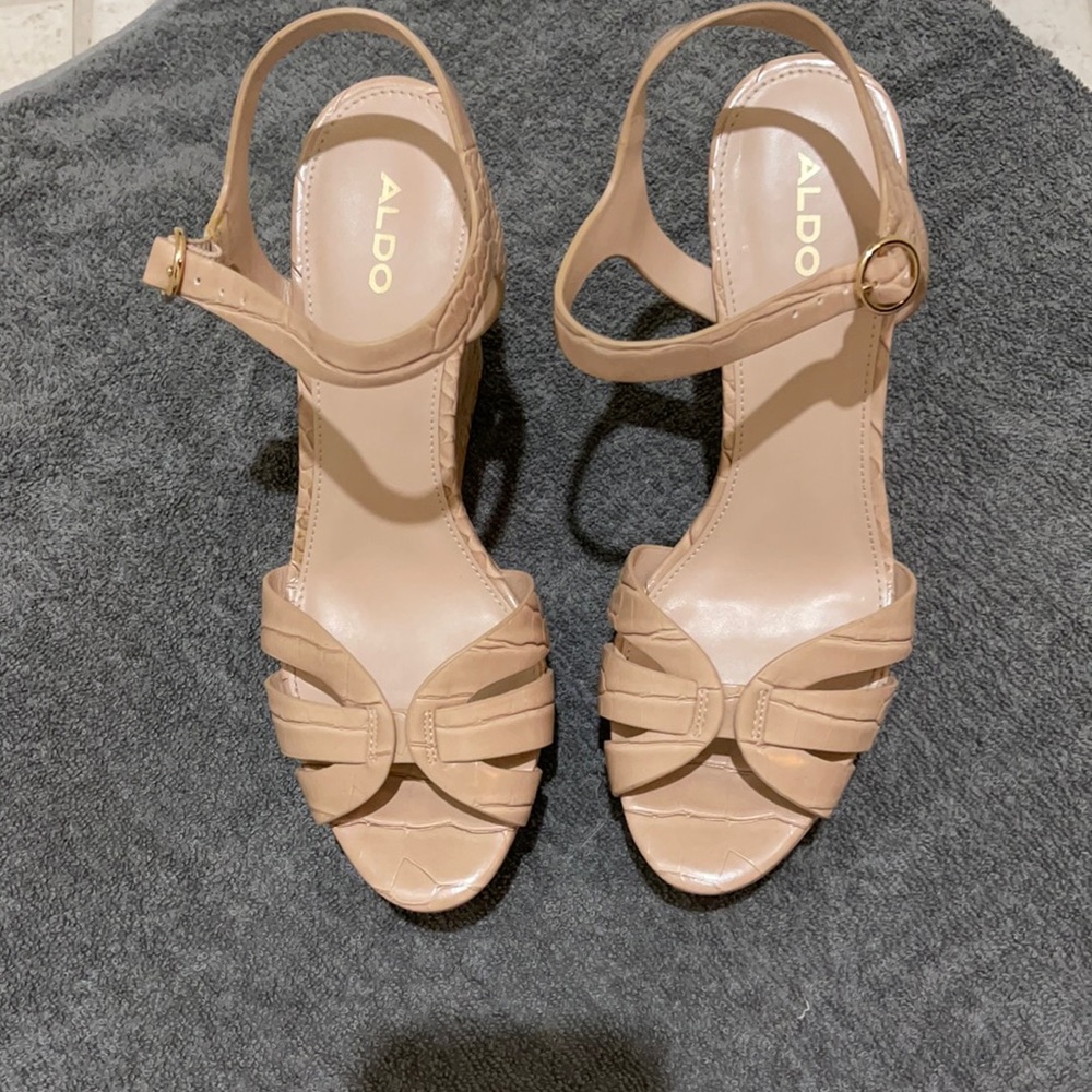 Brand New Taupe size 9 platforms made by Aldo